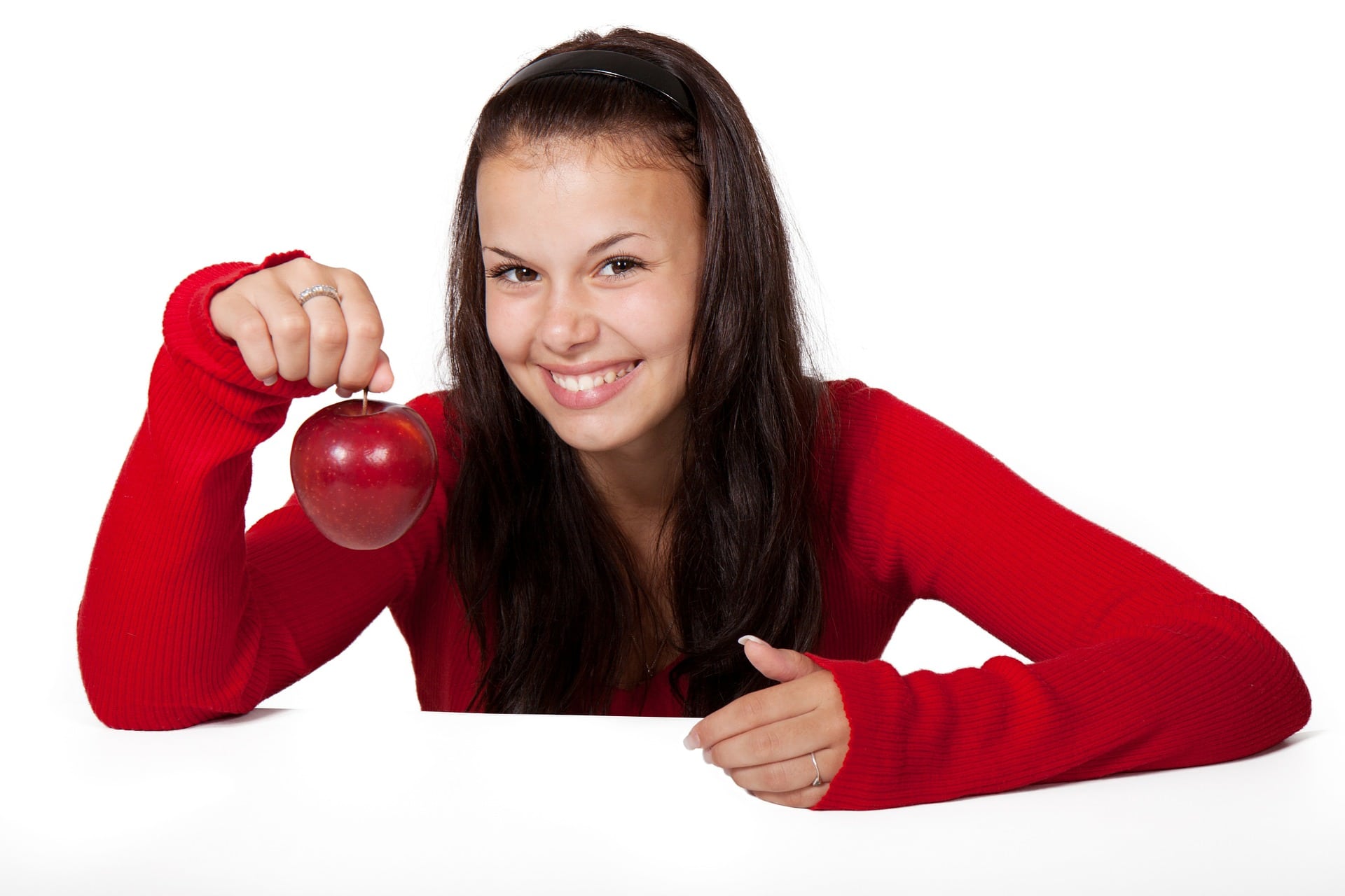 Girl holding healthy apple